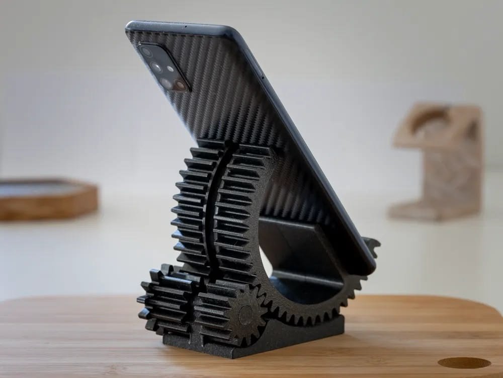 Soporte para celular con diseño de engranajes